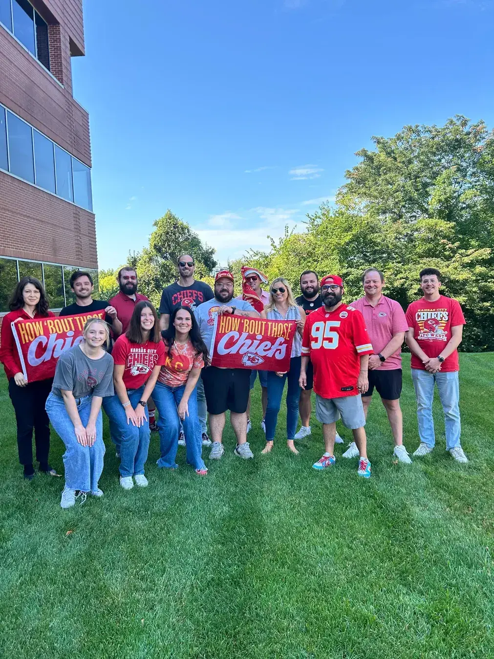 FanThreeSixty Employees cheering for the Chiefs
